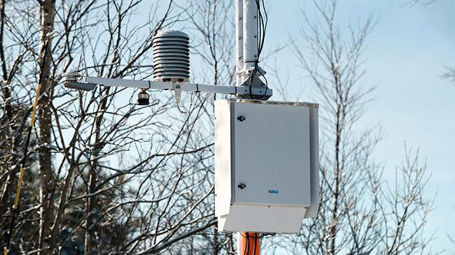 Vaisala Automatic Weather Station AWS310 installed outside.