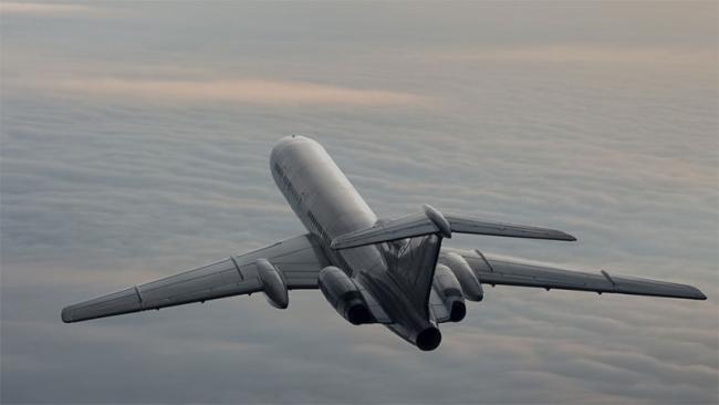 Airplane above the clouds
