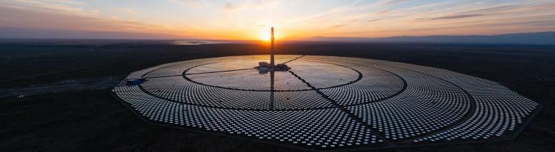 Panoramic view of solar thermal power station at sunset_HERO-tall